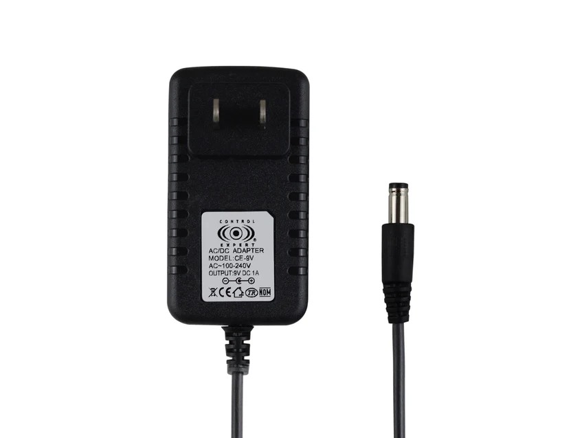 Eliminador De 9 V a 1 A Punta Negra Control Expert 5MM  CE-9V 1.2 Metros De Largo Negro